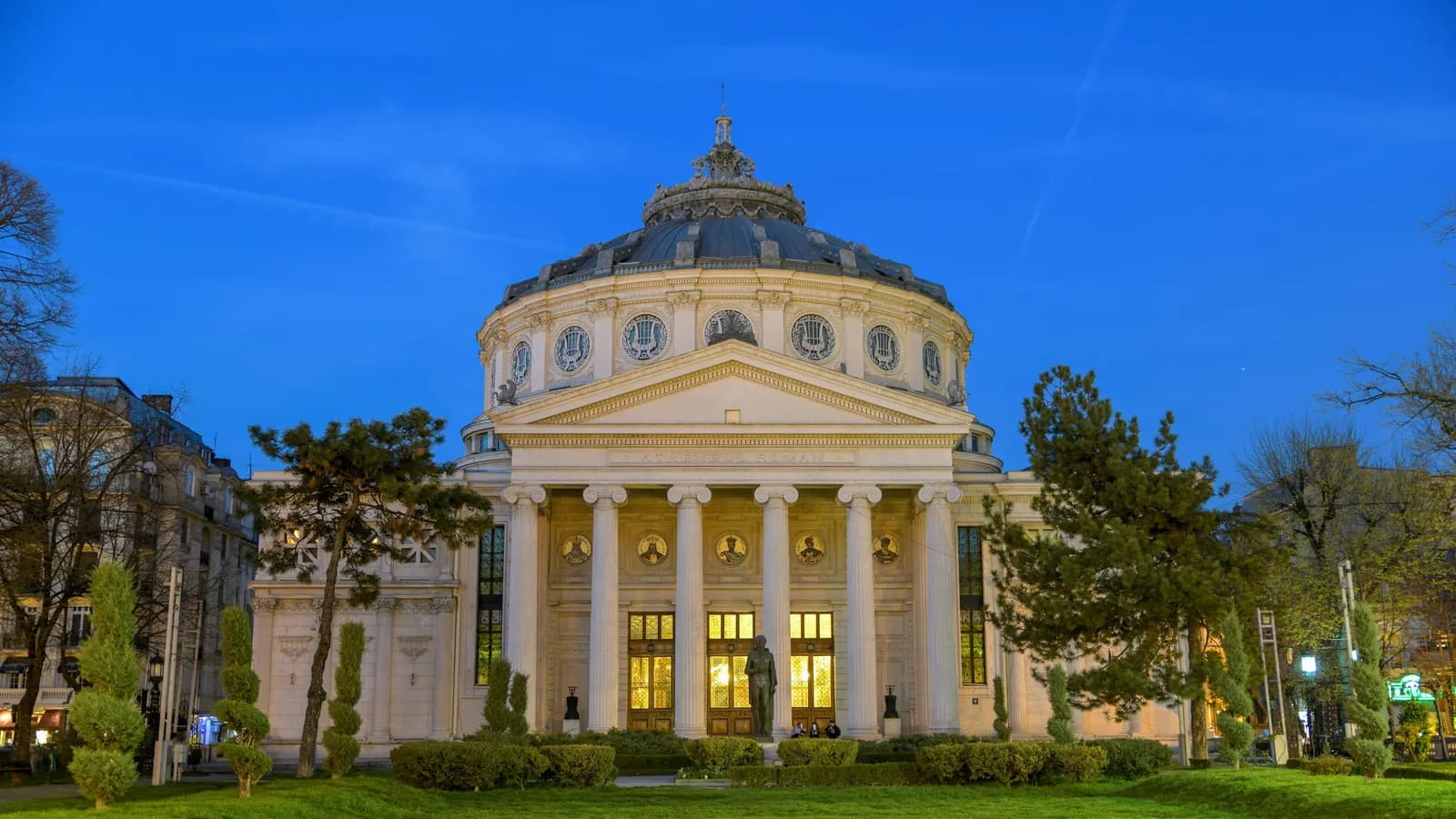 The Romanian Athenaeum concert hall in central Bucharest at dusk